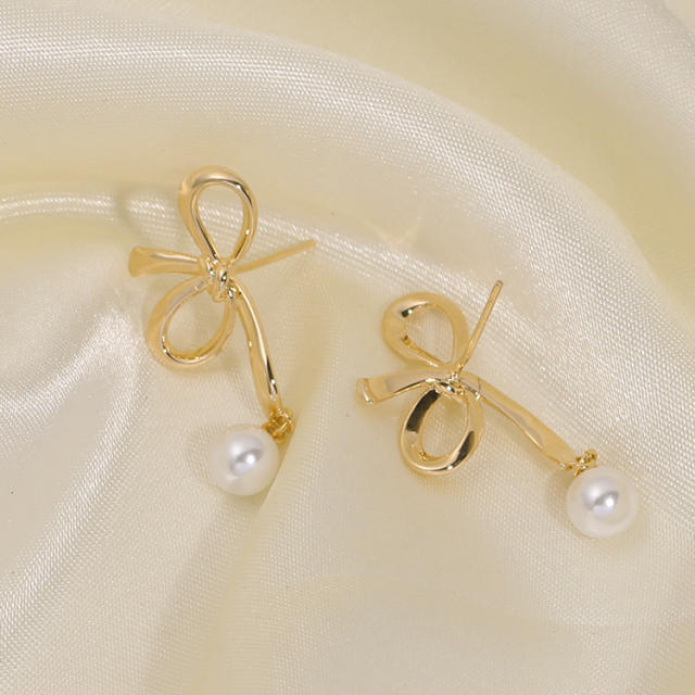 Hollow bow pearl bead clip on earrings drop earrings