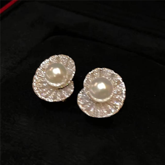 Elegant diamond shell shape pearl studs earrings