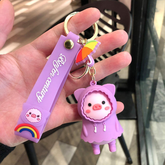 Creative raincoat pig cartoon keychain