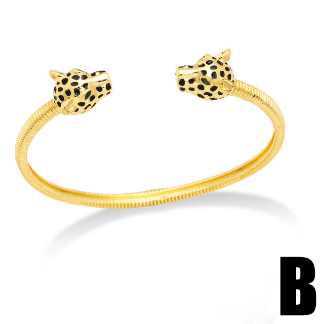 Vintage enamel leopard gold plated bangle