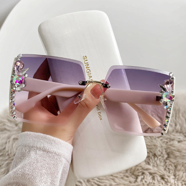 Elegant diamond rimless sunglasses
