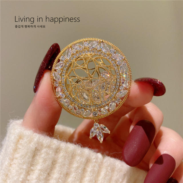 Elegant hollow out round shape cubic zircon setting brooch