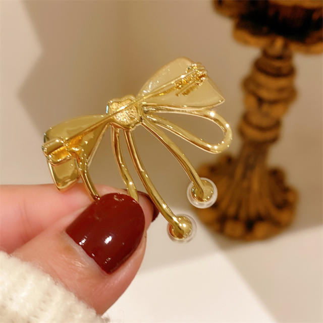 Vintage natural shell bow diamond brooch