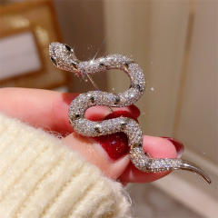 Elegant diamond snake brooch