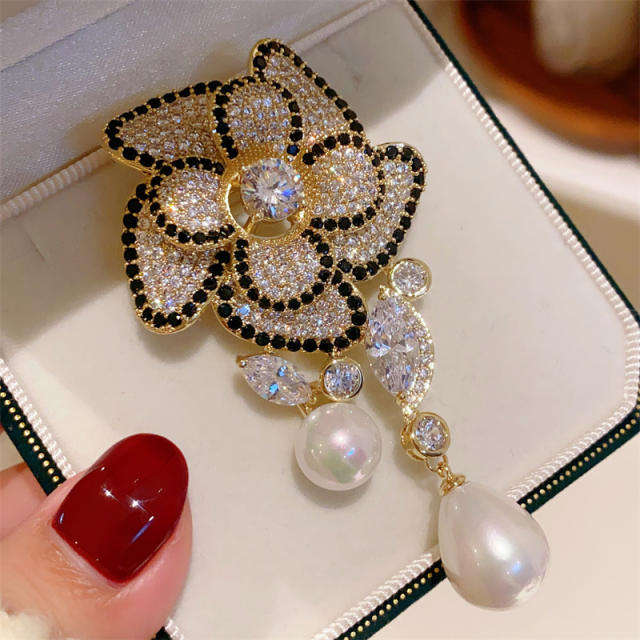 Vintage diamond flower pearl drop brooch