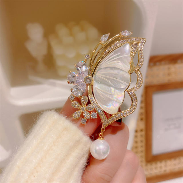 Vintage shell butterfly diamond brooch