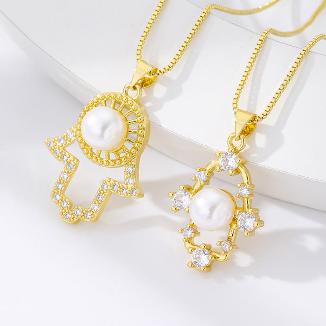 Hot sale pearl beads hollow hasma pendant necklace