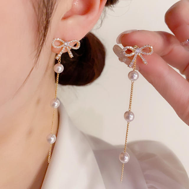 Korean fashion elegant hollow bow pearl earrings