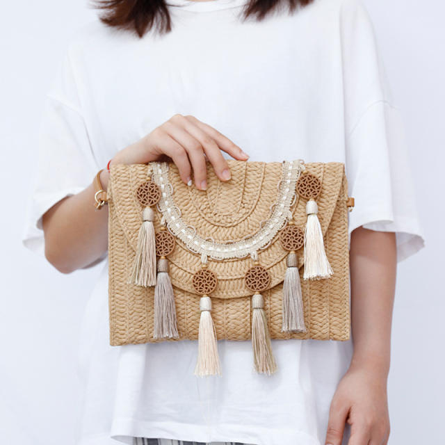 INS vintage tassel straw clutch