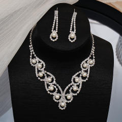 Elegant pearl rhinestone setting hollow jewelry set