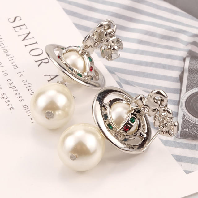 Elegant Saturn design pearl earrings