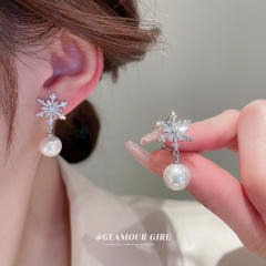 Diamond snowflake pearl earrings