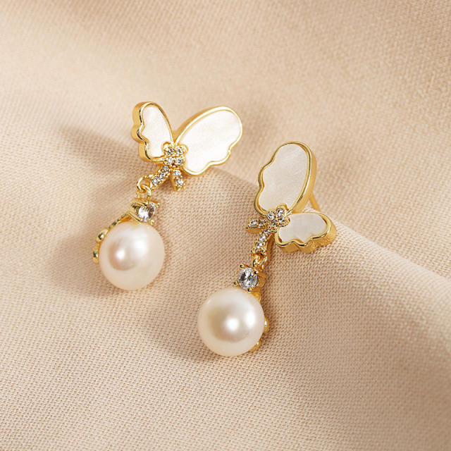Elegant butterfly pearl drop earrings