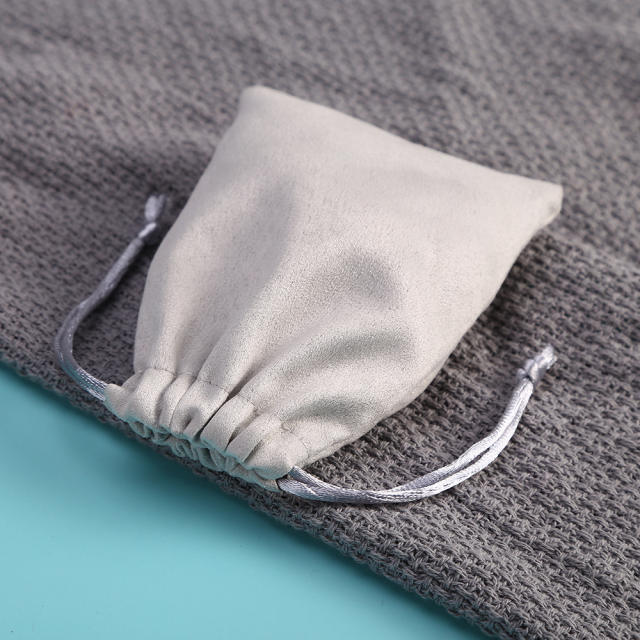 Gray color suede jewelry bag