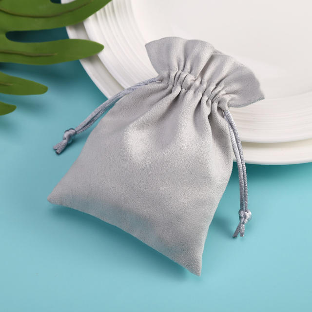 Gray color string jewelry bag