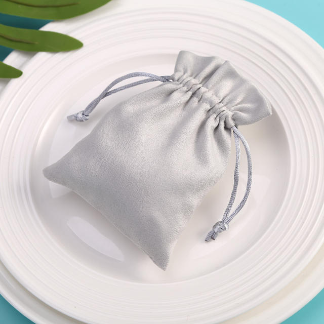 Gray color string jewelry bag
