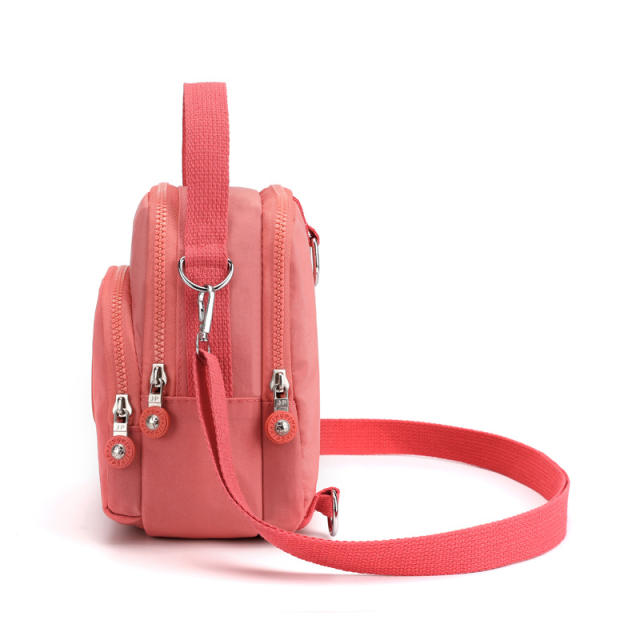 Large capacity plain color nylon mini backpack crossbody bag