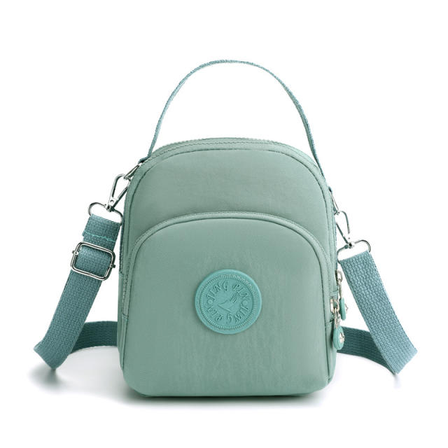 Large capacity plain color nylon mini backpack crossbody bag