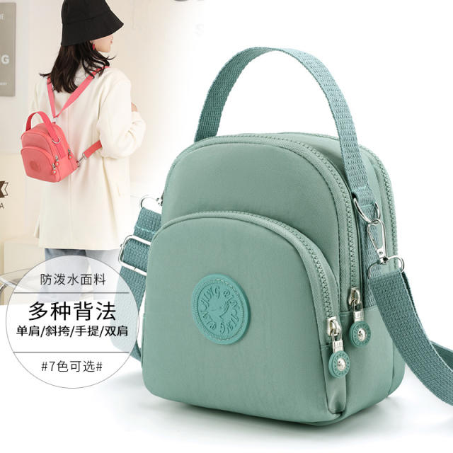 Large capacity plain color nylon mini backpack crossbody bag