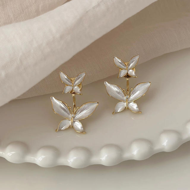 Elegant enamel white butterfly jacket earrings