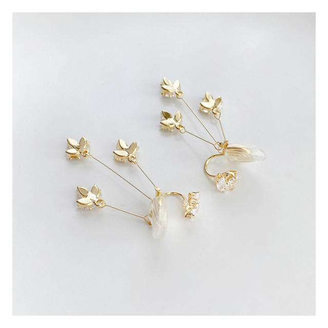 Diamond flower tassel clip on earrings