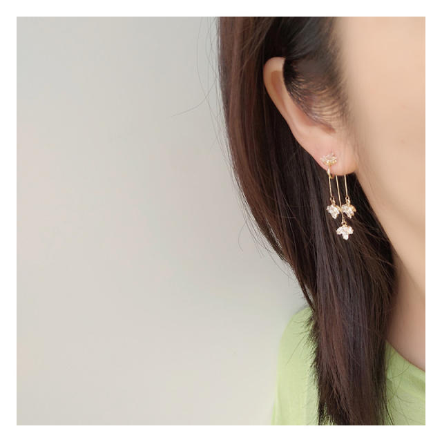 Diamond flower tassel clip on earrings