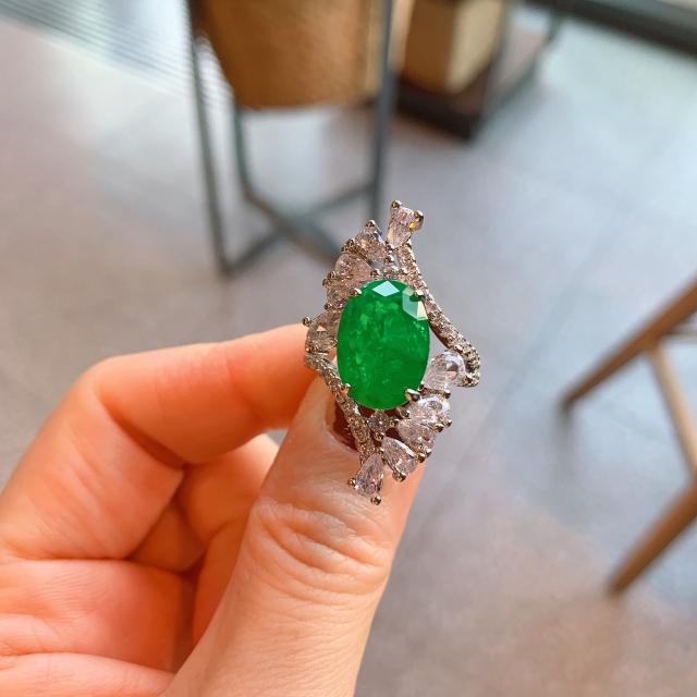 Elegant emerald statement copper rings