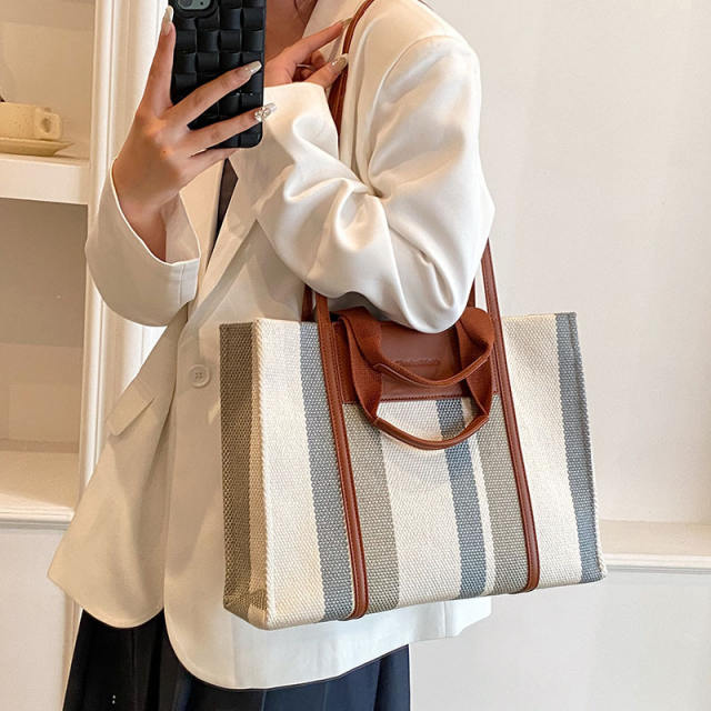Color matching striped canvas tote bag