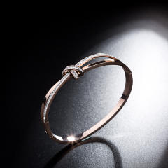 Delicate pave setting gem the bow shape stainless steel bangle bracelet