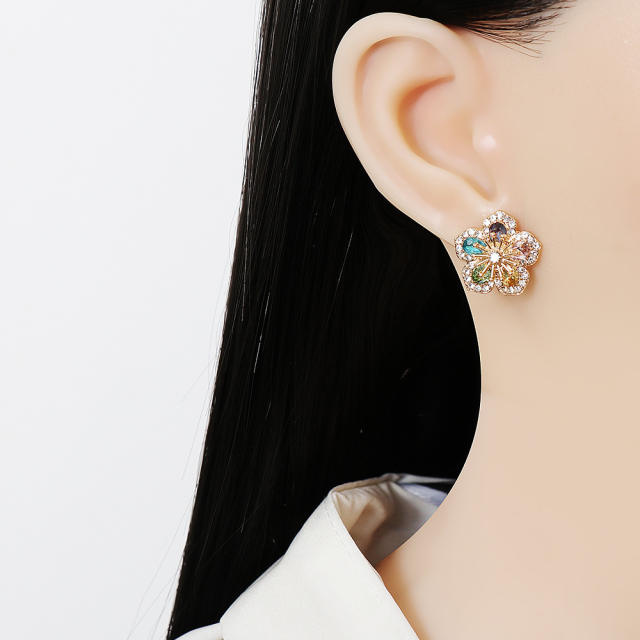 Diamond blooming flower studs earrings