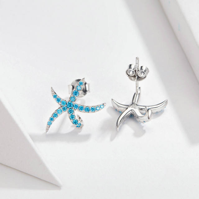 Delicate blue color diamond starfish sterling silver earrings