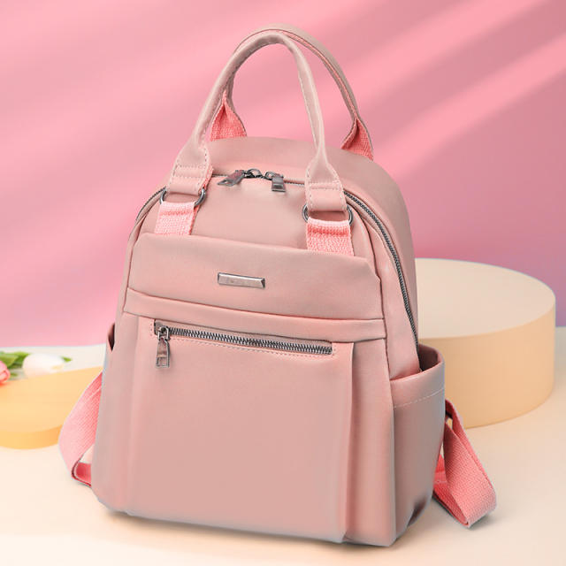 Plain color PU material soft backpack with handle