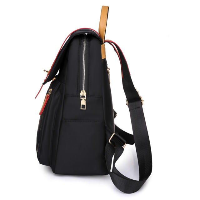 Korean fashion plain color oxford material backpack
