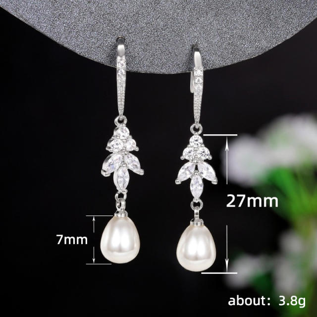 Elegant pearl drop diamond earrings