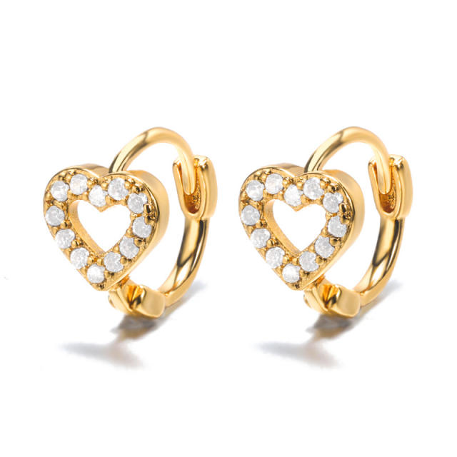 Delicate cubic zircon star gold plated copper huggie earrings