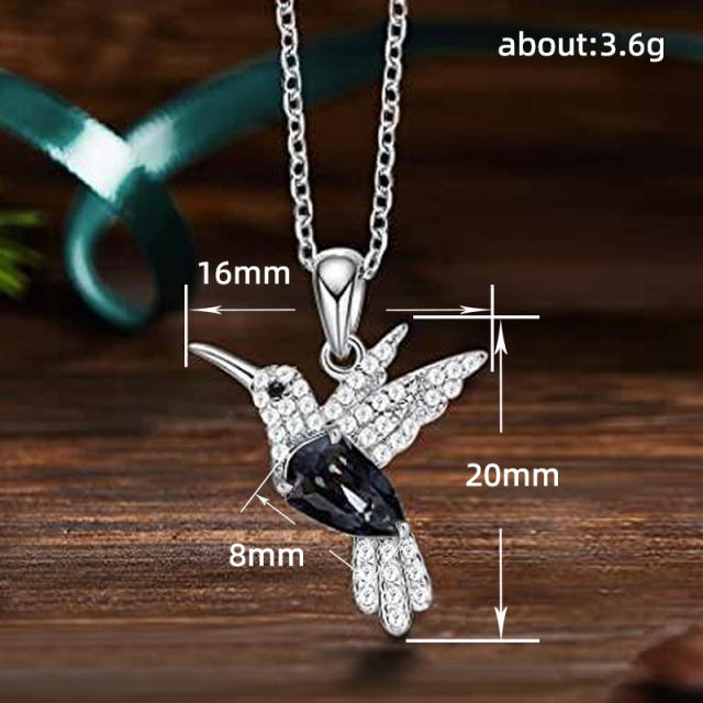 Dainty diamond hummingbird charm pendant necklace