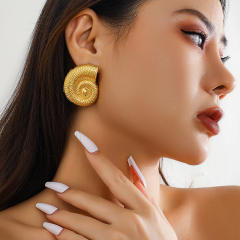 Gold conch earrings