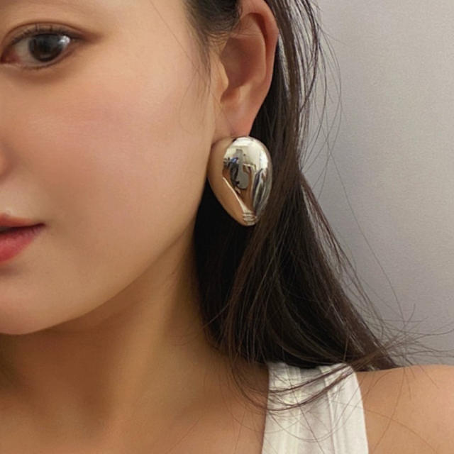 Occident fashion chunky face design copper studs earrings