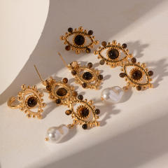 Vintage hollow out evil eye tiger eye bead stainless steel earrings