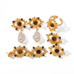 Vintage hollow out evil eye tiger eye bead stainless steel earrings