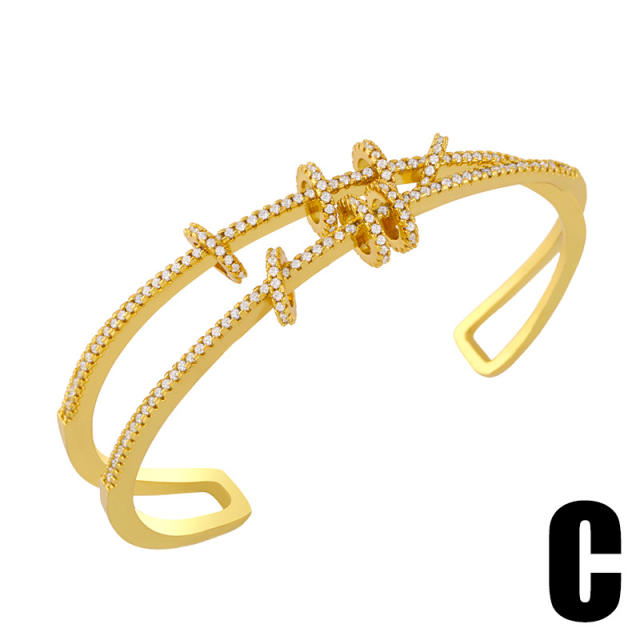 Hollow out diamond star gold plated copper bangle bracelet