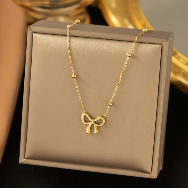 Dainty cute hollow bow stainless steel necklace earrings set