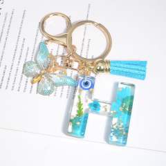 Spring blue daisy flower butterfly acrylic initial letter keychain