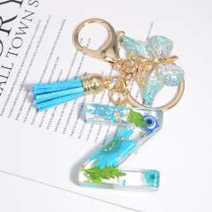 Spring blue daisy flower butterfly acrylic initial letter keychain
