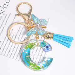 Spring blue daisy flower butterfly acrylic initial letter keychain