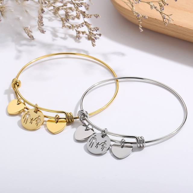 Delicate heart charm stainless steel bangle