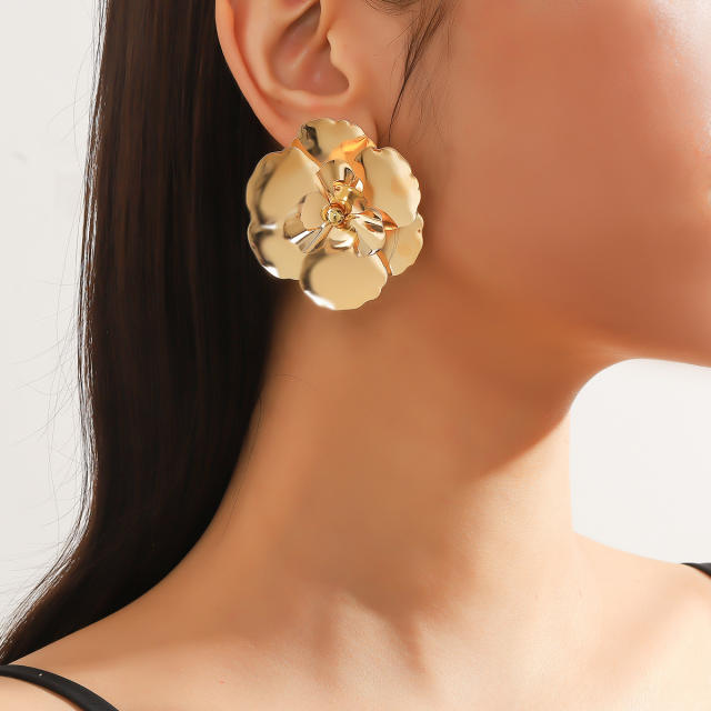 Chunky gold color blooming flower metal earrings