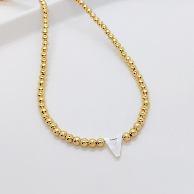 Natural shell initial letter gold plated copper beaded necklace