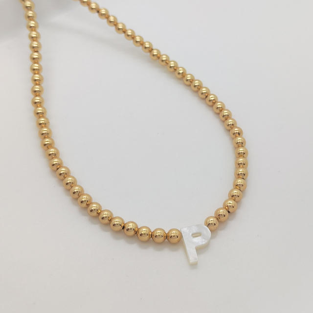 Natural shell initial letter gold plated copper beaded necklace