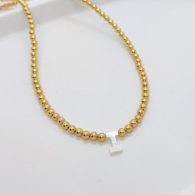 Natural shell initial letter gold plated copper beaded necklace